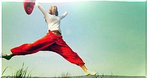 Woman jumps for joy