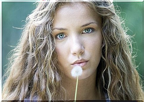 Woman with dandelion