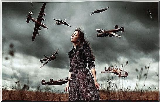 Girl standing between all war planes