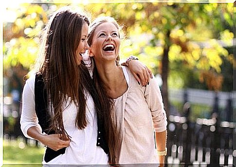 Two women laughing