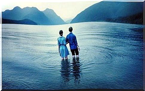 Couple standing in the water