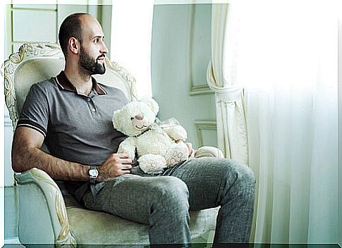 Man With Peter Pan Syndrome Holds On To Teddy Bear