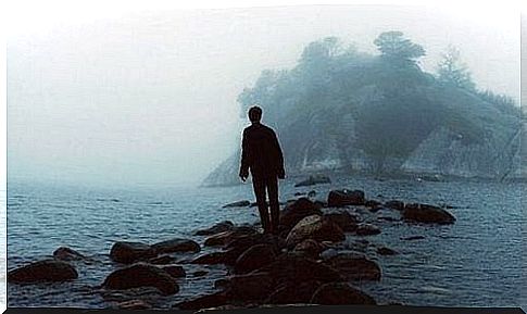 Man is alone on an island, as an example for the highly sensitive man. 